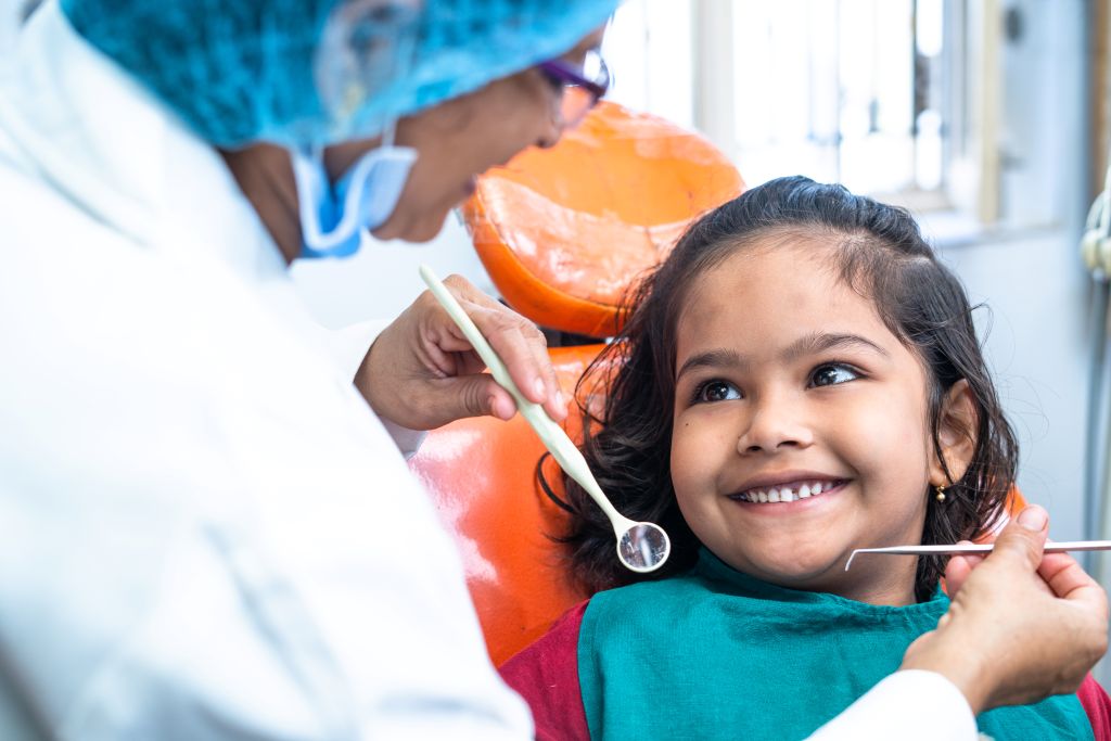 dentist with child